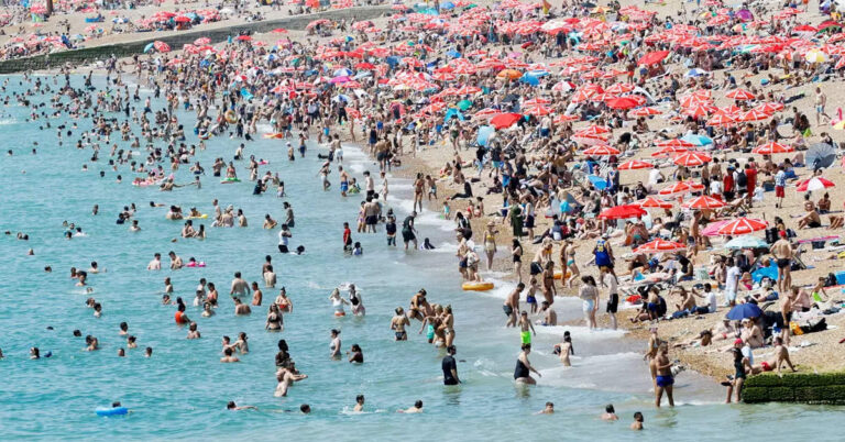 UK residents beat the heat as the country records highest ever temperature; see pics